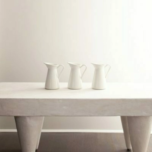 Showcase of a Vignette Atrium White colored wall behind a table